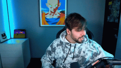 Bearded Man Sitting At Microphone GIF