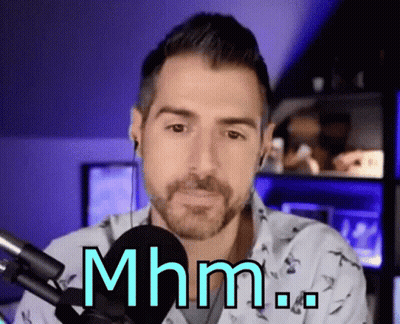 Bearded Man Sitting At Microphone Saying Mhm GIF