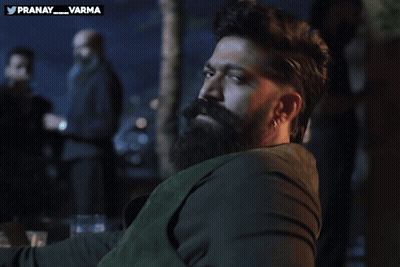Bearded Man Sitting At Pranay Varma Sign GIF