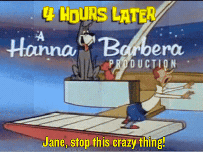 Bearded Man Sitting At Table With Folded Hands GIF