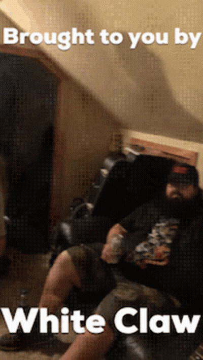 Bearded Man Sitting Brought To You By White Claw GIF