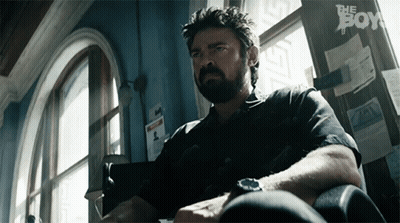 Bearded Man Sitting By Wall Saying The Boy GIF