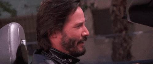 Bearded Man Sitting In Car With Letter H On Seat GIF