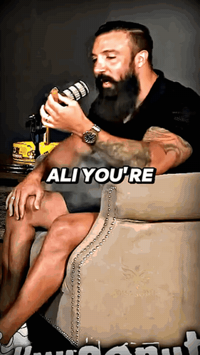 Bearded Man Sitting In Chair Saying Ali You're GIF