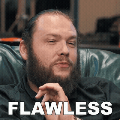 Bearded Man Sitting in Chair Saying Flawless