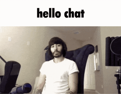 Bearded Man Sitting In Chair Saying Hello Chat GIF