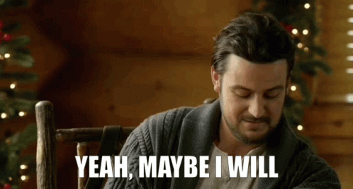 Bearded Man Sitting In Chair Saying Yeah Maybe I Will GIF