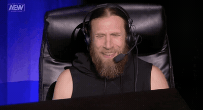 Bearded Man Sitting In Chair With Headphones GIF