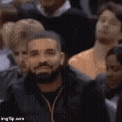 Bearded Man Sitting In Crowd Watching Game GIF