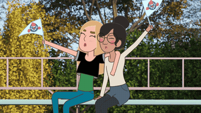 Bearded Man Sitting In Front Of Crowd On Soccer Field GIF