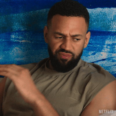 Bearded Man Sitting In Front Of Netflix Painting GIF