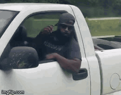 Bearded Man Sitting In White Truck Talking On Cell Phone GIF