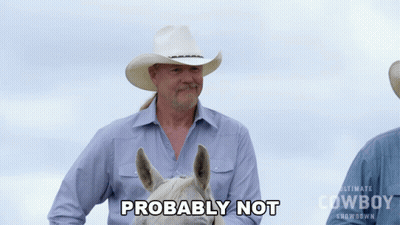 Bearded Man Sitting On Couch Smiling With Hand On Forehead GIF