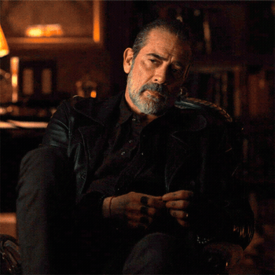 Bearded Man Sitting With Folded Hands GIF