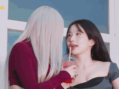 Bearded Man Sitting With Hands On Forehead GIF