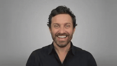 Bearded Man Smiling And Pointing At Camera GIF