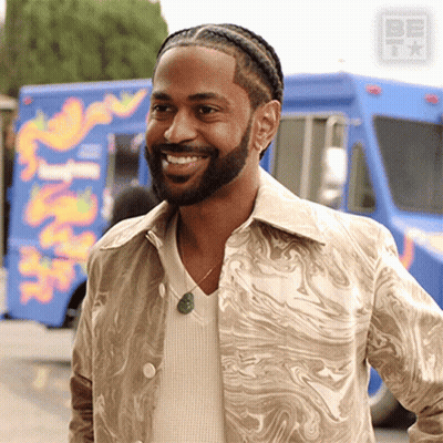 Bearded Man Smiling By Blue Shack Food Truck GIF