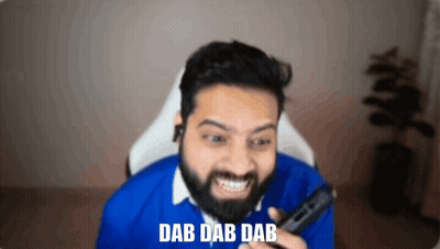 Bearded Man Smiling Holding Remote Saying Dab Dab Dab GIF