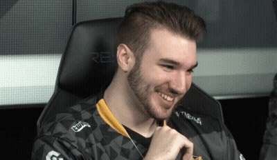 Bearded Man Smiling In Chair Saying Re GIF