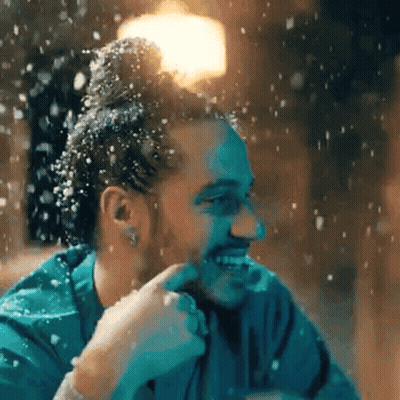 Bearded Man Smiling In Falling Snow GIF
