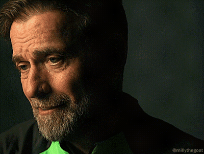 Bearded Man Smiling In Green Shirt GIF