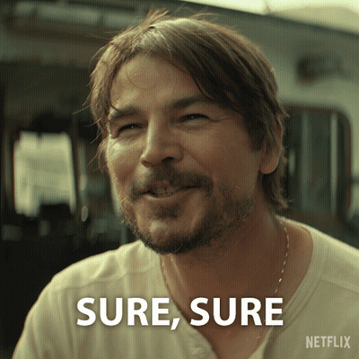 Hombre barbudo sonriendo diciendo: Claro, claro GIF