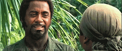 Bearded Man Smiling Talking In Jungle GIF