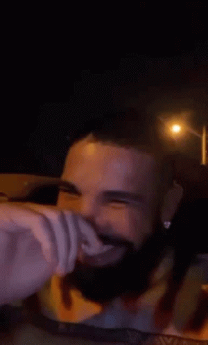 Bearded Man Smiling While Driving GIF