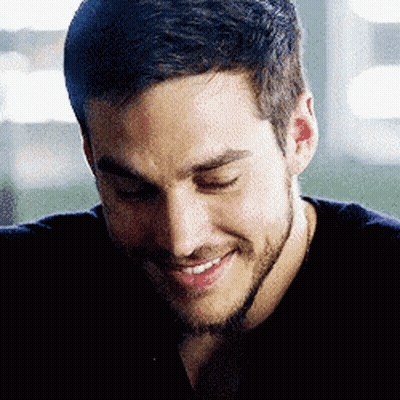 Bearded Man Smiling With Eyes Closed In Black Shirt GIF