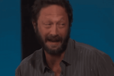 Bearded Man Smiling With Eyes Closed