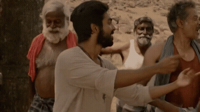 Bearded Man Standing Before Group GIF