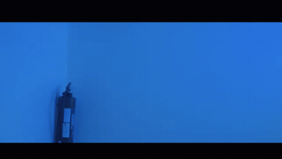 Bearded Man Standing In Blue Light GIF