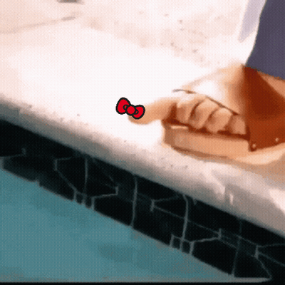 Bearded Man Standing In Crowd With Hands In Pockets GIF