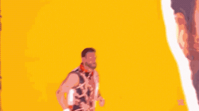 Bearded Man Standing In Front Of Another Man With Mouth Open GIF