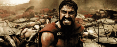 Bearded Man Standing In Front Of Battlefield GIF