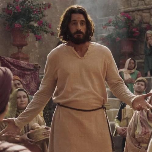 Bearded Man Standing In Front Of Crowd GIF