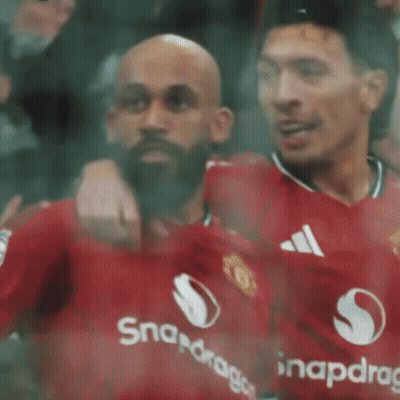 Bearded Man Standing In Front Of Crowd GIF