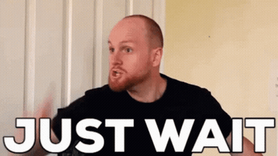 Bearded Man Standing In Front Of Door Saying Just Wait GIF