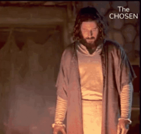 Bearded Man Standing In Front Of Fire With The Chosen GIF