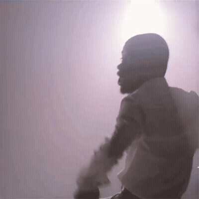 Bearded Man Standing In Front Of Purple GIF