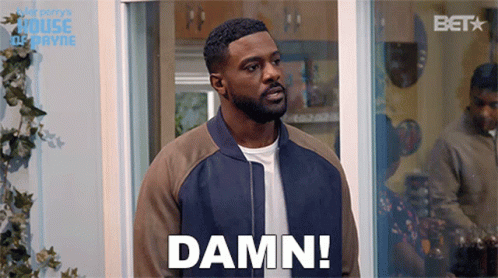 Bearded Man Standing In Front Of Window Saying Damn GIF