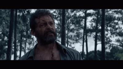 Bearded Man Standing In Woods GIF