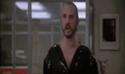 Bearded Man Standing With Word Kneel GIF