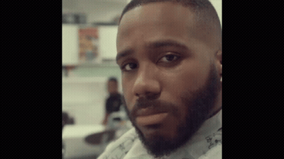 Bearded Man Staring At Camera GIF
