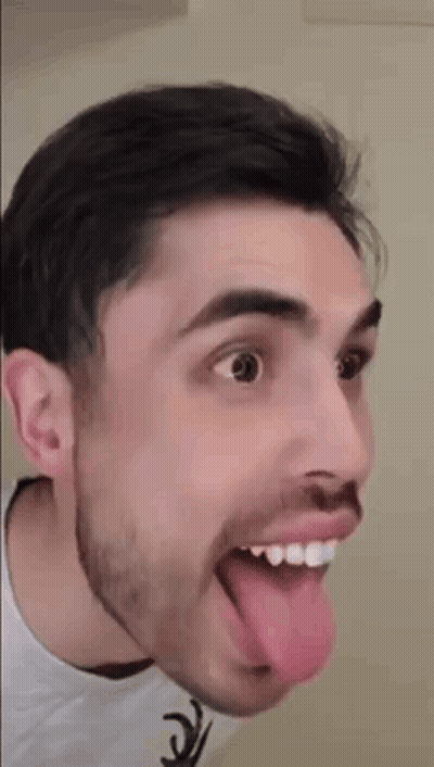 Bearded Man Sticking Tongue Out Smiling GIF