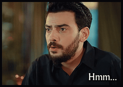 Bearded Man Surprised Saying Hmm GIF