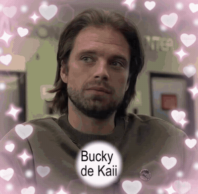 Bearded Man Surrounded By Pink Hearts Bucky De Kaii GIF