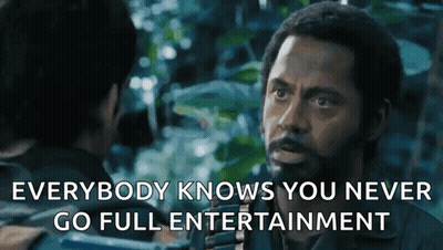 Bearded Man Talking To Another Man In Movie GIF