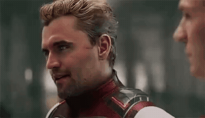 Bearded Man Talking To Superhero GIF