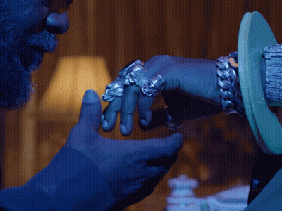 Bearded Man Touching Ringed Hand GIF